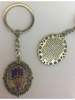 Emaillierter Schlüsselanhänger Kraftvolle Hand 45 x 30mm