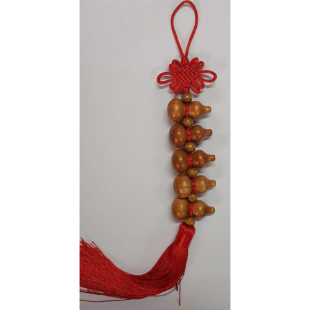 Peruanischer Kürbisaufhänger aus Holz . 35cm
