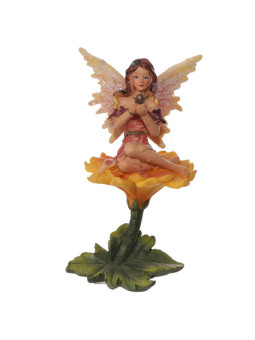 Fee auf Blume sitzend. 11 cm hoch x 11,5 cm breit.