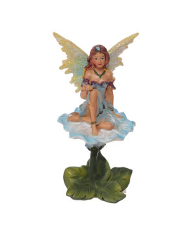 Fee auf Blume sitzend. 11 cm hoch x 11,5 cm breit.