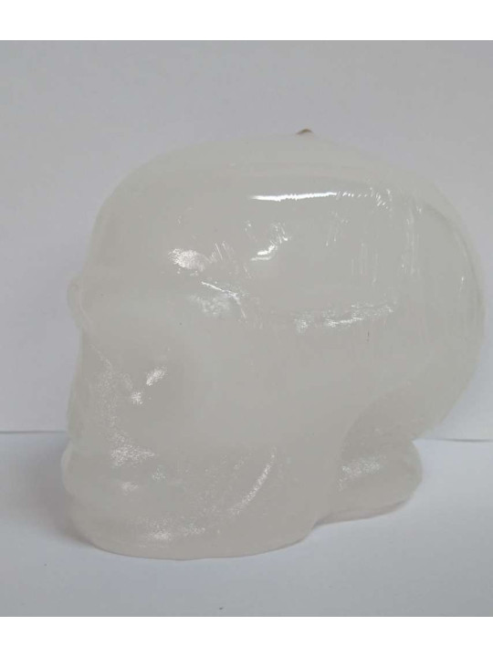 Weiße Totenkopf-Kerze. 11 x 9 Zentimeter