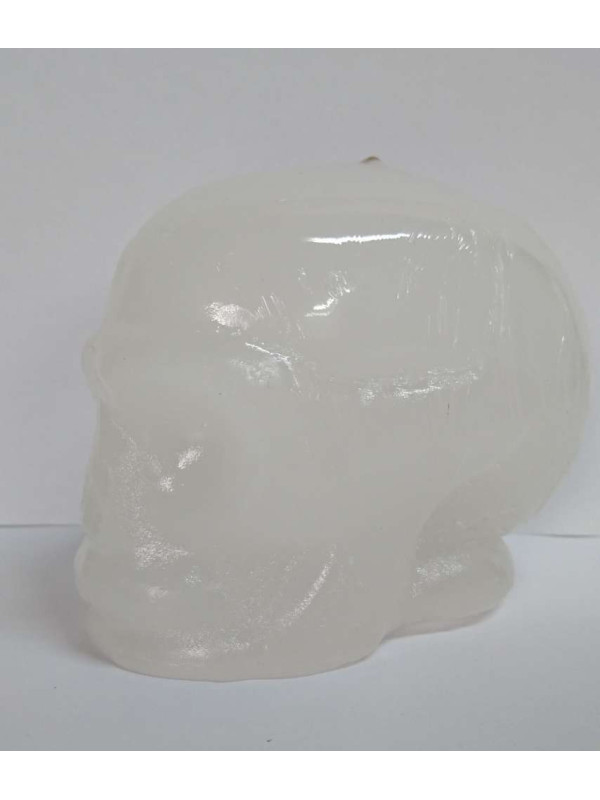 Weiße Totenkopf-Kerze. 11 x 9 Zentimeter