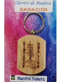 Schlüsselanhänger aus Holz mit Fernheilungssymbol