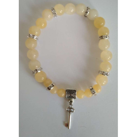 Gelbes Jaspis-Mineral-Armband mit Glücksschlüssel