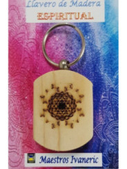 Schlüsselanhänger aus Holz mit spirituellem Symbol