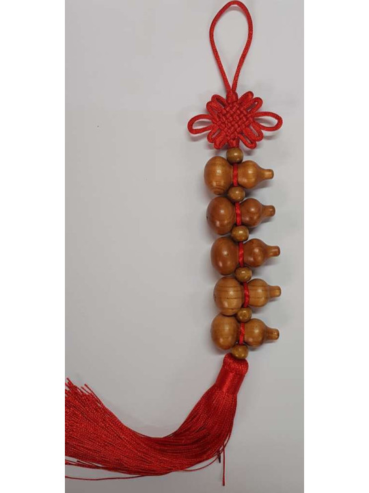 Peruanischer Kürbisaufhänger aus Holz . 35cm