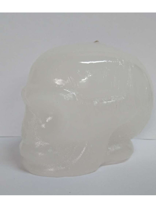 Weiße Totenkopf-Kerze. 11 x 9 Zentimeter