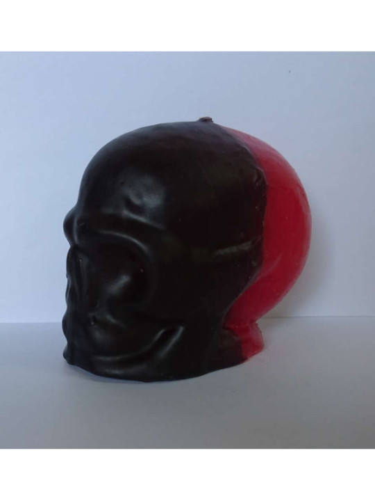 Rote Totenkopfkerze, schwarz. 11 x 9 Zentimeter